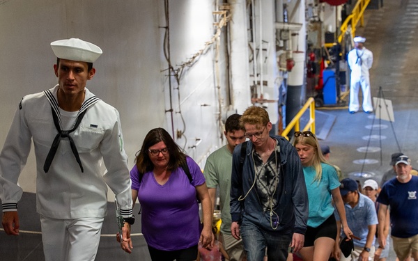Sailor gives a tour aboard Wasp-class amphibious assault ship USS Iwo Jima (LHD 7)