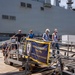 Guests board Arleigh Burke-class guided-missile destroyer USS Bainbridge (DDG 96)