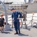 Sailor conducts a tour aboard Arleigh Burke-class guided-missile destroyer USS Bainbridge (DDG 96)