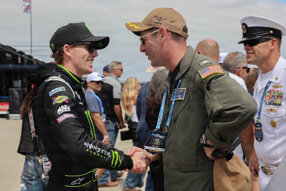 Naval Base Coronado Leaders meet NASCAR racer Riley Herbst's team
