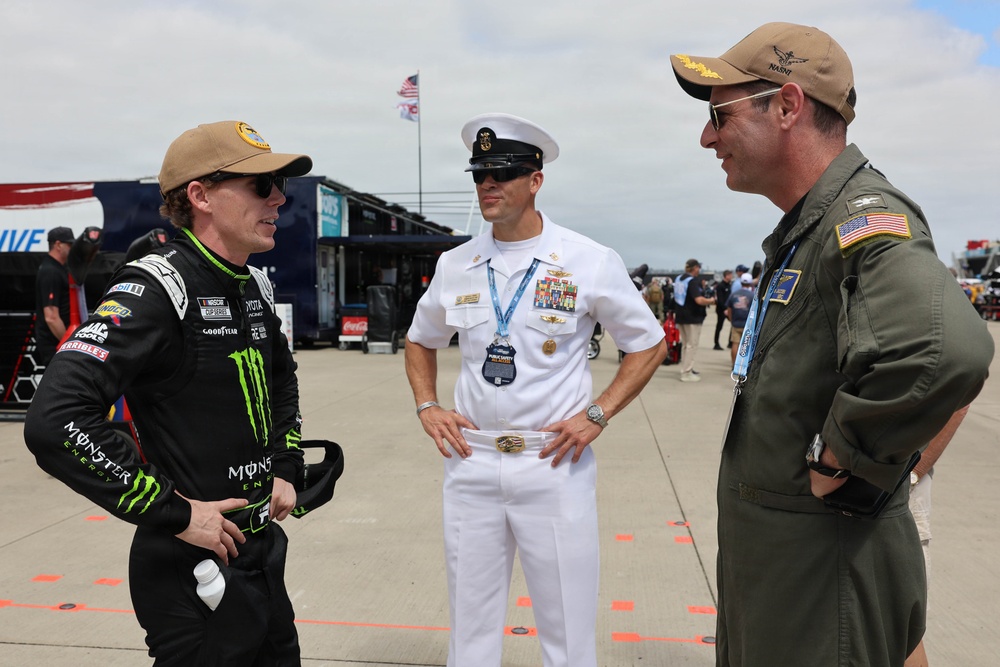 Naval Base Coronado Leaders meet NASCAR racer Riley Herbst's team