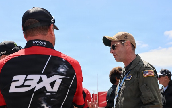 Naval Base Coronado Leaders meet NASCAR racer Riley Herbst's team