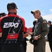 Naval Base Coronado Leaders meet NASCAR racer Riley Herbst's team