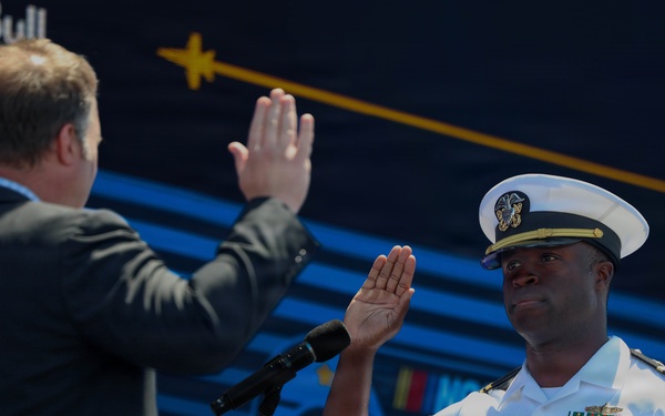 Lt. Cmdr. Jesse Iwuji, NASCAR driver #91 promoted to commander