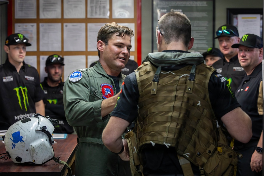NASCAR driver Ty Gibbs’ team tours HSM-35 during the NASCAR San Diego Weekend