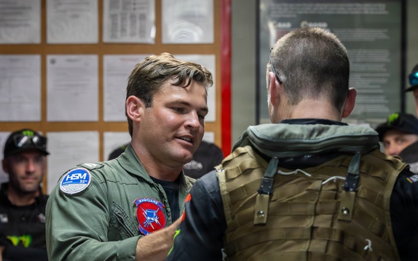 NASCAR driver Ty Gibbs’ team tours HSM-35 during the NASCAR San Diego Weekend