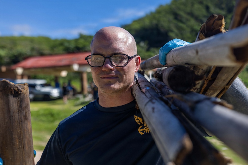 George Washington Participates in a Beach Cleanup at Tagachang Beach