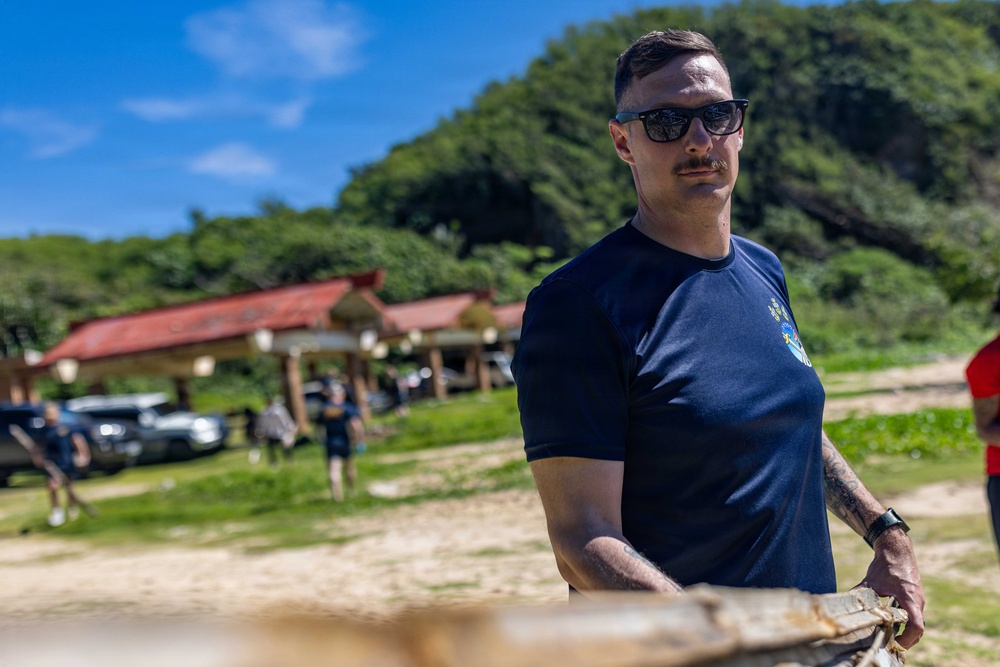 George Washington Participates in a Beach Cleanup at Tagachang Beach