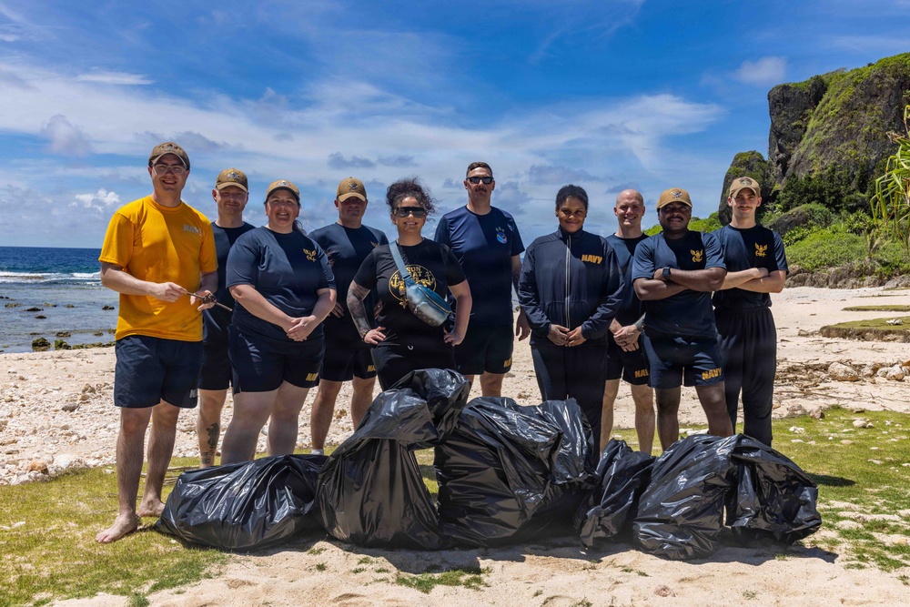George Washington Participates in a Beach Cleanup at Tagachang Beach