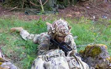 U.S. Army soldier takes covered position during Spectrum Blitz 26