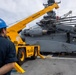 : 26th Marine Expeditionary Unit’s Type Commander’s Amphibious Training | HMH-461 and Sailors conduct crane operations aboard the USS Kearsarge