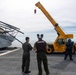 26th Marine Expeditionary Unit’s Type Commander’s Amphibious Training | HMH-461 and Sailors conduct crane operations aboard the USS Kearsarge