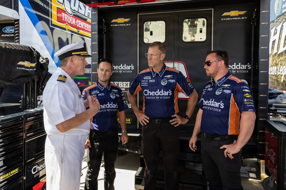 Kyle Busch's team receives ceremonial flag during NASCAR San Diego Weekend