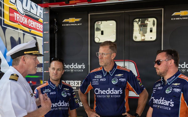 Kyle Busch's team receives ceremonial flag during NASCAR San Diego Weekend