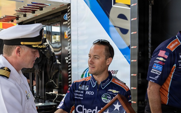 Kyle Busch's team receives ceremonial flag during NASCAR San Diego Weekend