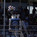 NASCAR official waves checkered flag to signify the end of the NASCAR Cup Series: Anduril 250 Race the Base at NASCAR San Diego Weekend