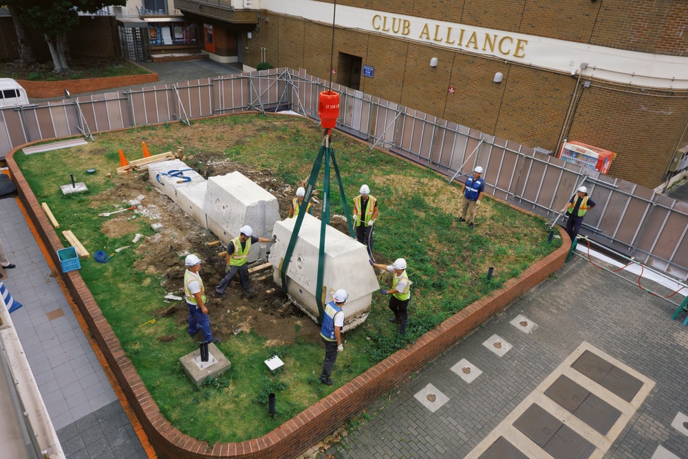CFAY, NAVFAC Remove Decorative Sign for Water Line Repair