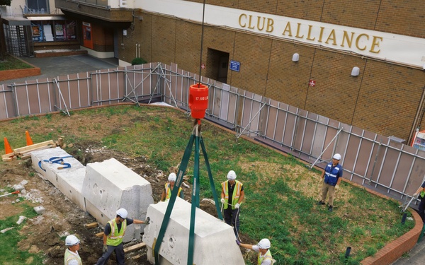 CFAY, NAVFAC Remove Decorative Sign for Water Line Repair