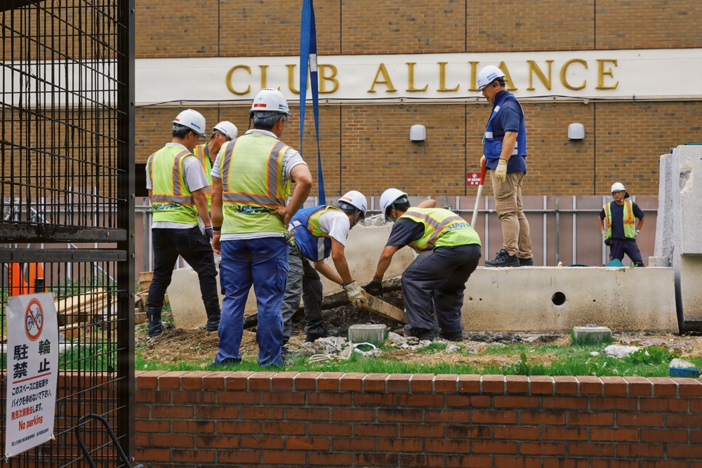 CFAY, NAVFAC Remove Decorative Sign for Water Line Repair