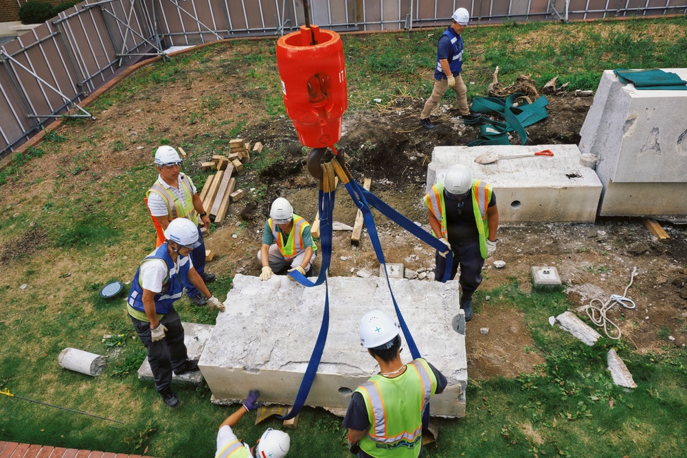 CFAY, NAVFAC Remove Decorative Sign for Water Line Repair