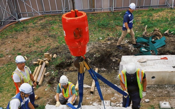 CFAY, NAVFAC Remove Decorative Sign for Water Line Repair