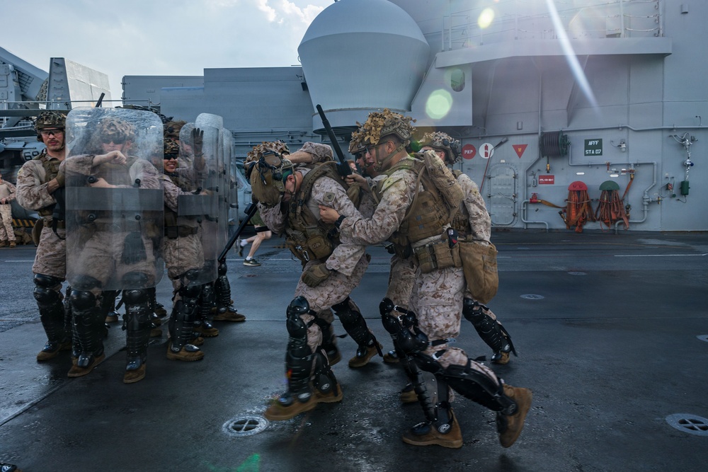11th MEU Marines, Sailors Conduct Non-Lethal Weapons Training Aboard USS Boxer