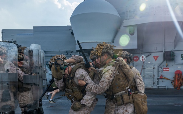 11th MEU Marines, Sailors Conduct Non-Lethal Weapons Training Aboard USS Boxer