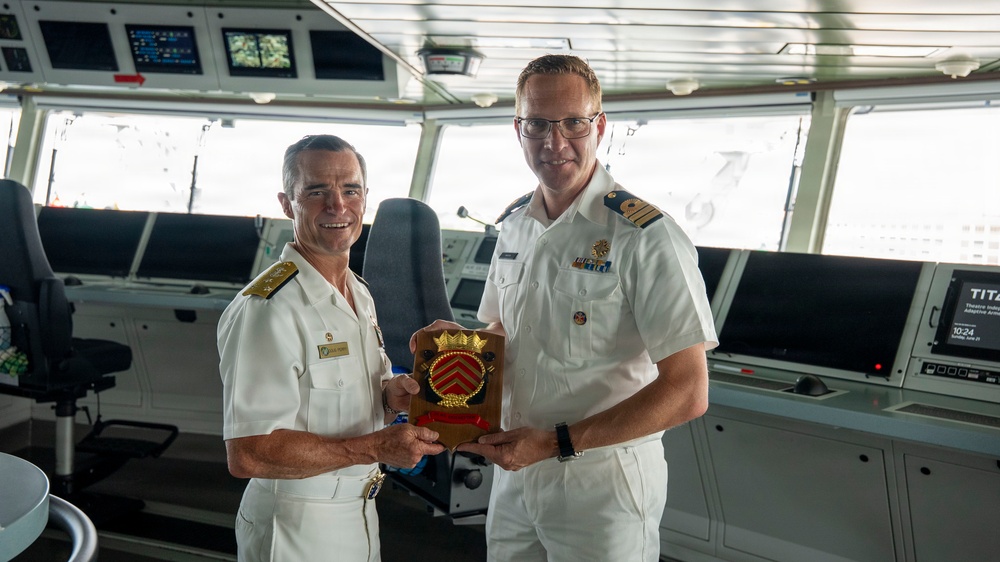 Vice Adm. Doug Perry, Commander, U.S. 2nd Fleet, Accepts a Placard from the Commanding Officer of the Royal Netherlands Navy's Combat Support Ship HNLMS Den Helder