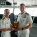 Vice Adm. Doug Perry, Commander, U.S. 2nd Fleet, Accepts a Placard from the Commanding Officer of the Royal Netherlands Navy's Combat Support Ship HNLMS Den Helder