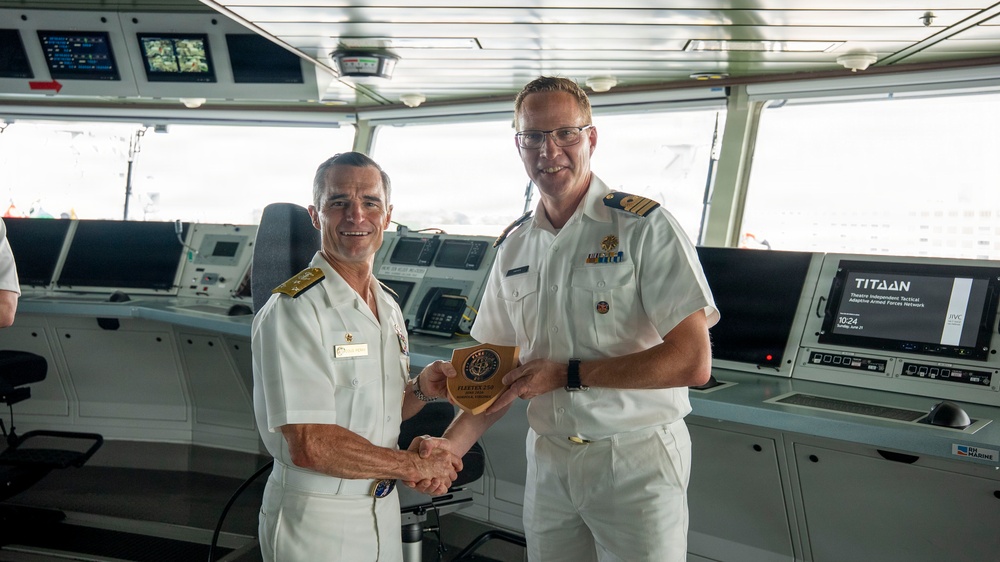 Vice Adm. Doug Perry, Commander, U.S. 2nd Fleet, Presents a Placard to the Commanding Officer of the Royal Netherlands Navy's Combat Support Ship HNLMS Den Helder