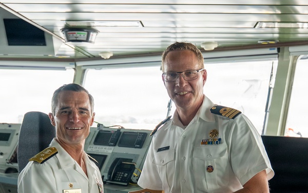 Vice Adm. Doug Perry, Commander, U.S. 2nd Fleet, Presents a Placard to the Commanding Officer of the Royal Netherlands Navy's Combat Support Ship HNLMS Den Helder
