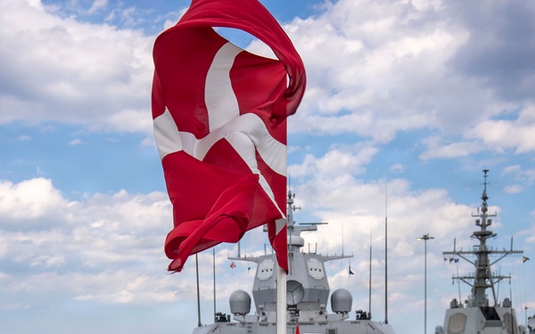 Vice Adm. Doug Perry, Commander, U.S. 2nd Fleet, Speaks to the Commanding Officer of the Royal Danish Navy Frigate HDMS Iver Huitfeldt