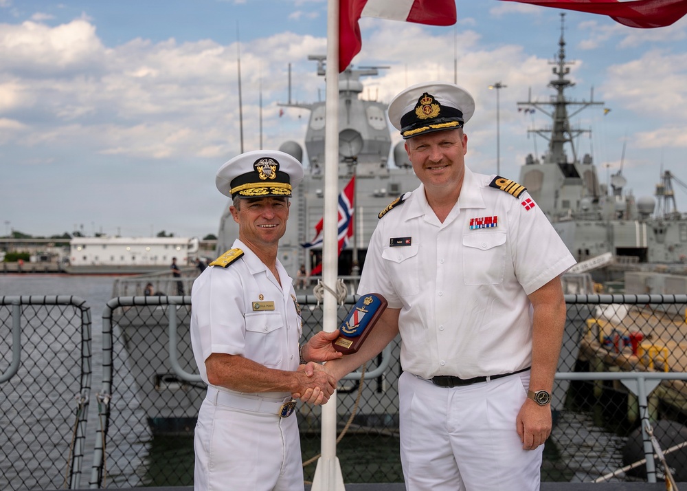 Vice Adm. Doug Perry, commander, U.S. 2nd Fleet, Accepts a Placard from the Commanding Officer of the Royal Danish Navy Frigate HDMS Iver Huitfeldt
