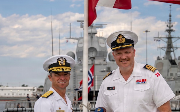 Vice Adm. Doug Perry, commander, U.S. 2nd Fleet, Accepts a Placard from the Commanding Officer of the Royal Danish Navy Frigate HDMS Iver Huitfeldt