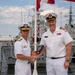 Vice Adm. Doug Perry, commander, U.S. 2nd Fleet, Accepts a Placard from the Commanding Officer of the Royal Danish Navy Frigate HDMS Iver Huitfeldt