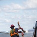 Curtin crew members perform equipment maintenance