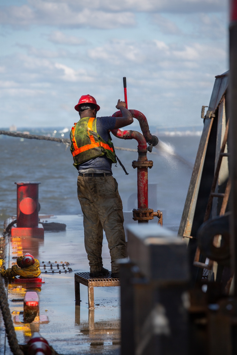 Curtin crew members perform equipment maintenance