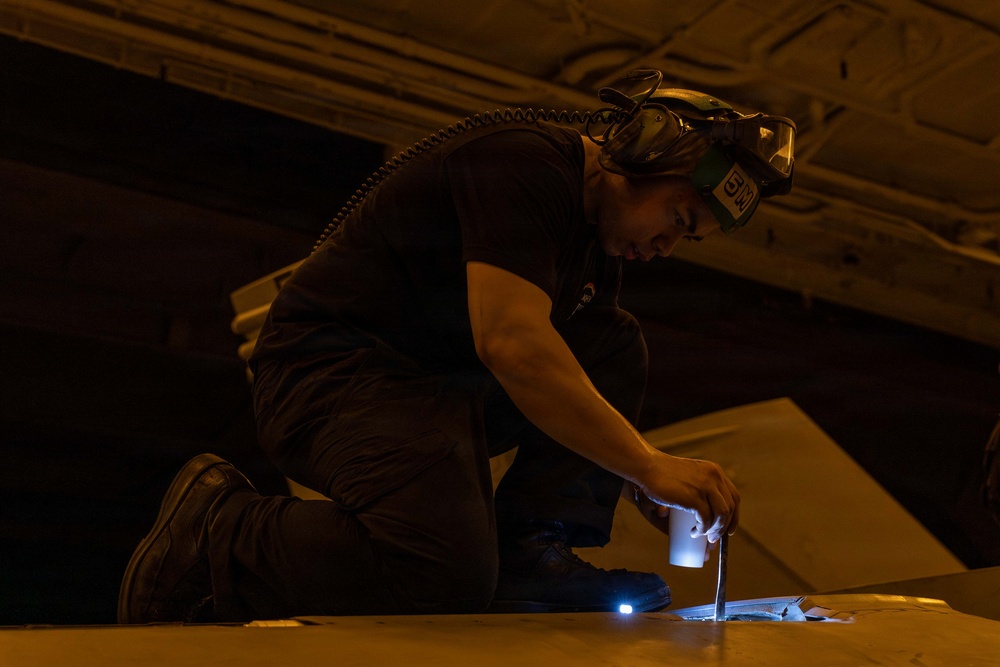 Abraham Lincoln Sailors Conduct Hangar Bay Operations