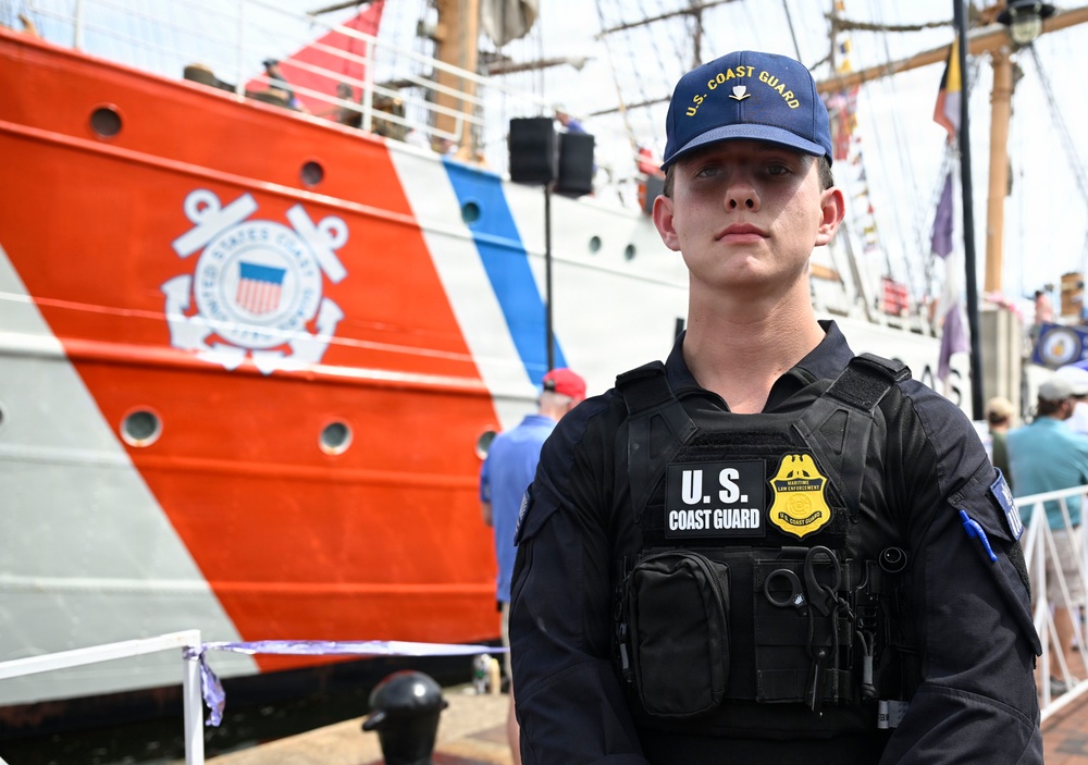 U.S. Coast Guard Petty Officer 3rd Class Gavin Stites stands watch for the Coast Guard Cutter Eagle