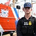U.S. Coast Guard Petty Officer 3rd Class Gavin Stites stands watch for the Coast Guard Cutter Eagle