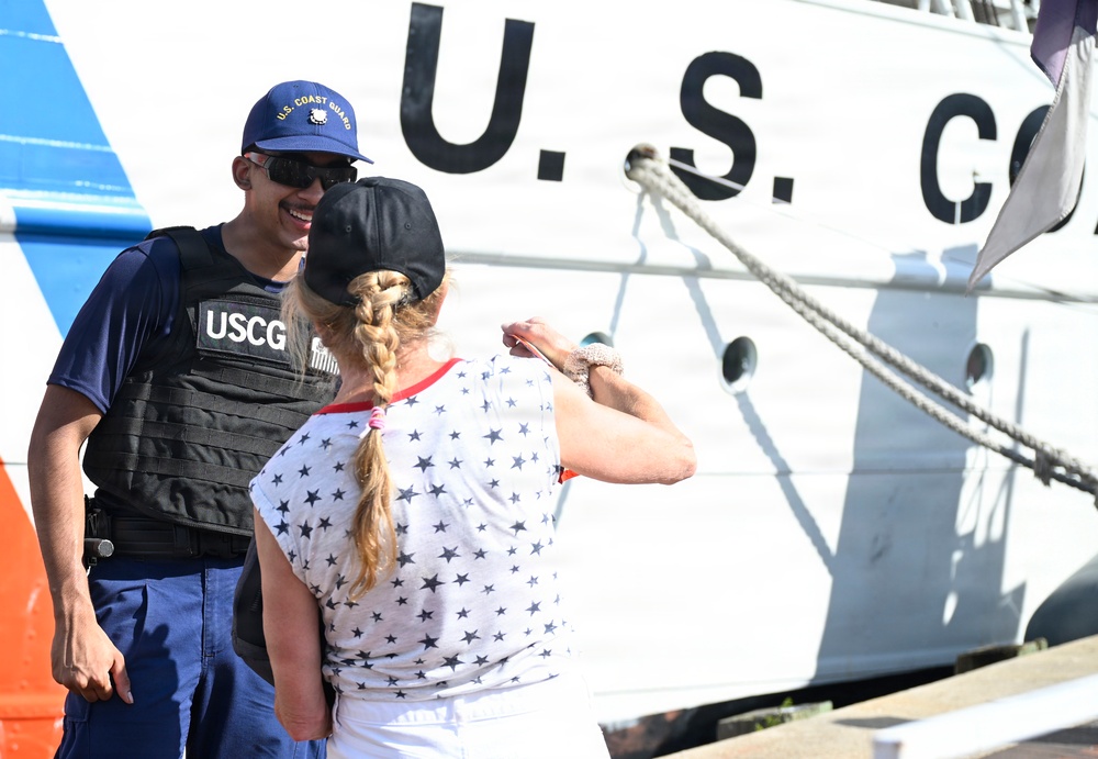 U.S. Coast Guard Fireman Dakyne Braun stands watch at the Coast Guard Cutter Eagle