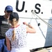 U.S. Coast Guard Fireman Dakyne Braun stands watch at the Coast Guard Cutter Eagle
