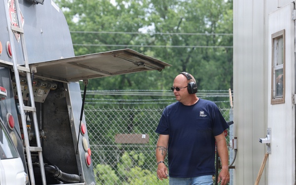 Lockport Lockmaster refuels generator after storms in the area