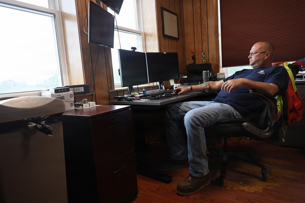Lockport Lockmaster sits in his office at Lockport Lock during interview