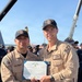 USS PAUL IGNATIUS bids farewell to departing sailors