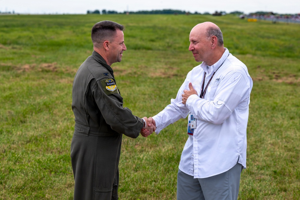 Col. Powers coins retired Brig. Gen. Mark Auer