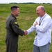 Col. Powers coins retired Brig. Gen. Mark Auer