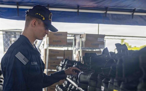 Sailors Shop for Uniforms and Gear at JBPHH Reclaimed Uniform Sale