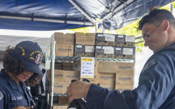 Sailors Shop for Uniforms and Gear at JBPHH Reclaimed Uniform Sale
