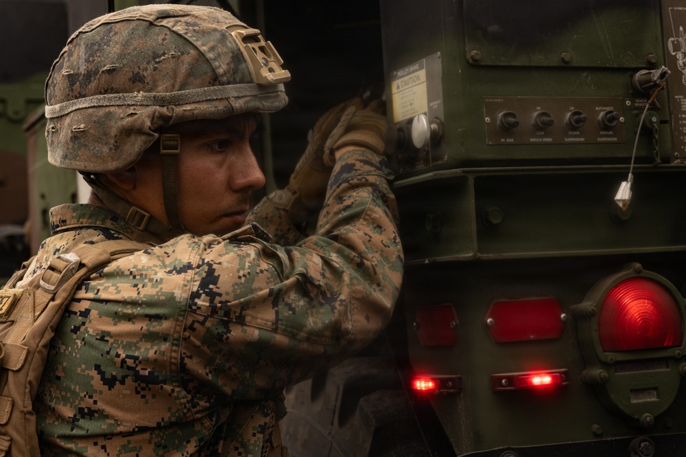 HIJUDAI MANEUVER AREA, OITA, JAPAN – U.S. Marines with 12th Marine Littoral Regiment Rehearse Bilateral Vehicle Recovery Procedures During Exercise Resolute Dragon 26